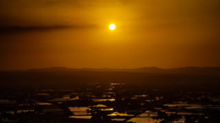 閑乗寺公園から見る砺波平野に映る夕日