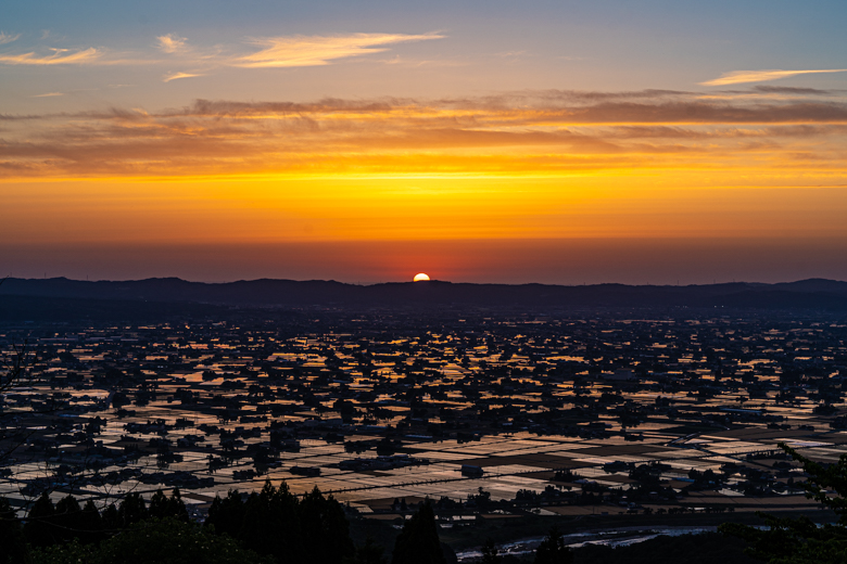 散居村と夕日